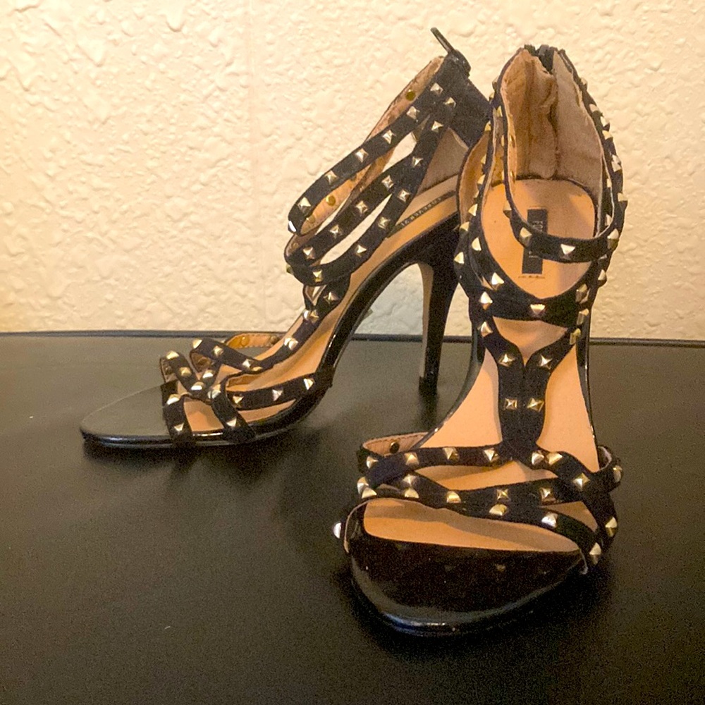 Black and gold studded stilettos